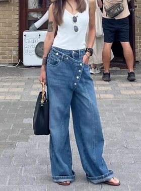 美式高街不规则排扣牛仔裤女2025春设计感错位拼接宽松显瘦阔腿裤