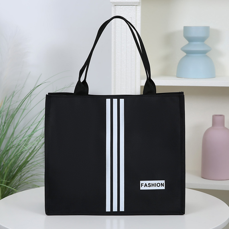 新款时尚便携式手提包大容量牛津布包简约外出上班时尚通勤便当包