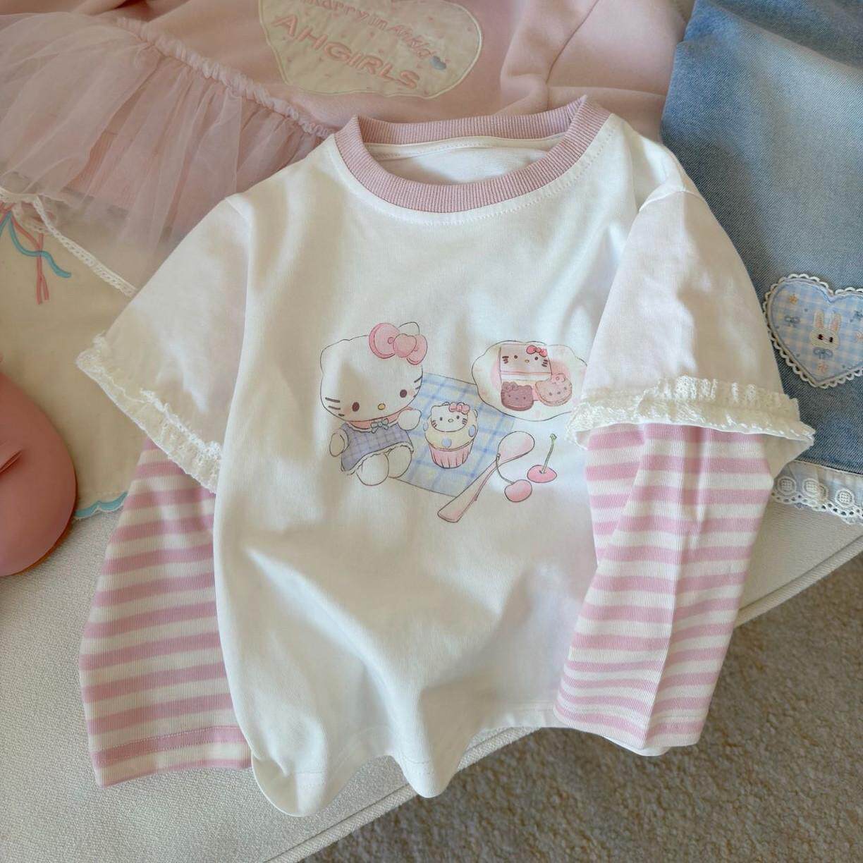 女宝宝春季上衣2026女童KT猫咪卡通印花长袖T恤条纹花边拼接打底