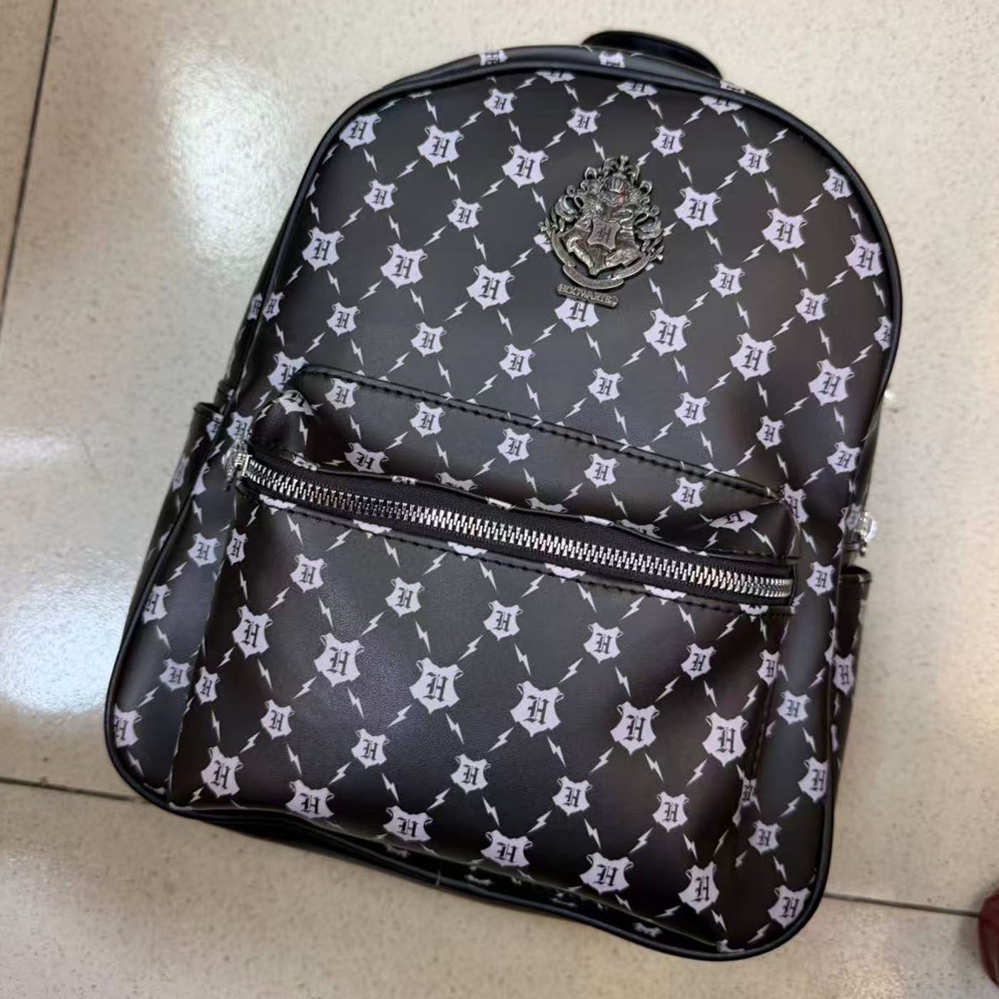哈利的痛包黑色闪电老花款双肩旅双肩背包