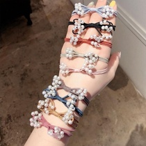 Korean version bow pearl head rope hair rope BEADED HAIR circle South Korean ins small fresh simple Sen female headdress
