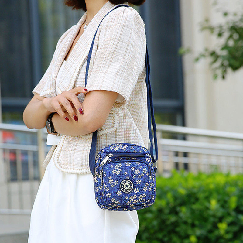 布包斜挎包女新款大容量旅游妈妈花包包轻便多层单肩侧背斜跨包小