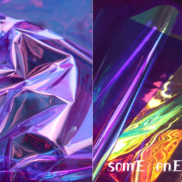蓝紫色原创透明薄款镭射膜幻彩tpu荧光服防水皮革婚庆设计师布料