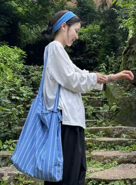 韩版文艺风新款蓝色竖条纹帆布袋大容量日常通勤百搭单肩包斜挎包