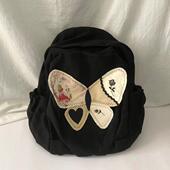 2025新款 小众复古双肩包包女撞色蝴蝶书包帆布包学生上课通勤包潮