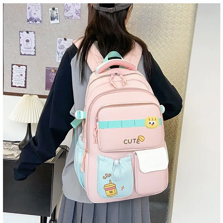 2024翼豹新款女书包新款韩版4-6年级大容量初中女生校园双肩包
