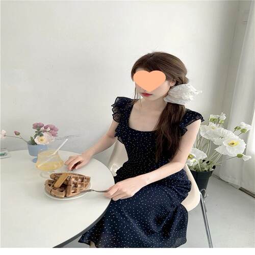 波点藏青吊带连衣裙女法式茶歇中长裙收腰显瘦新款时尚气质长裙潮