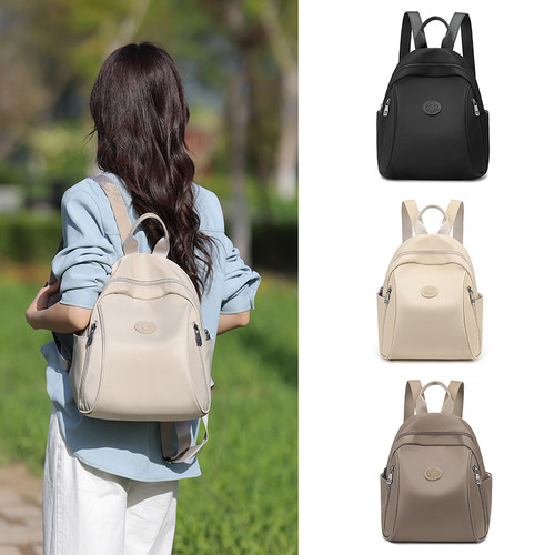 牛津布双肩包女2025新款时尚尼龙防水旅行通勤小背包简约帆布书包