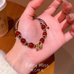仿红玛瑙蝴蝶结红绳手链女设计师款编织红绳个性百搭装饰合金手饰