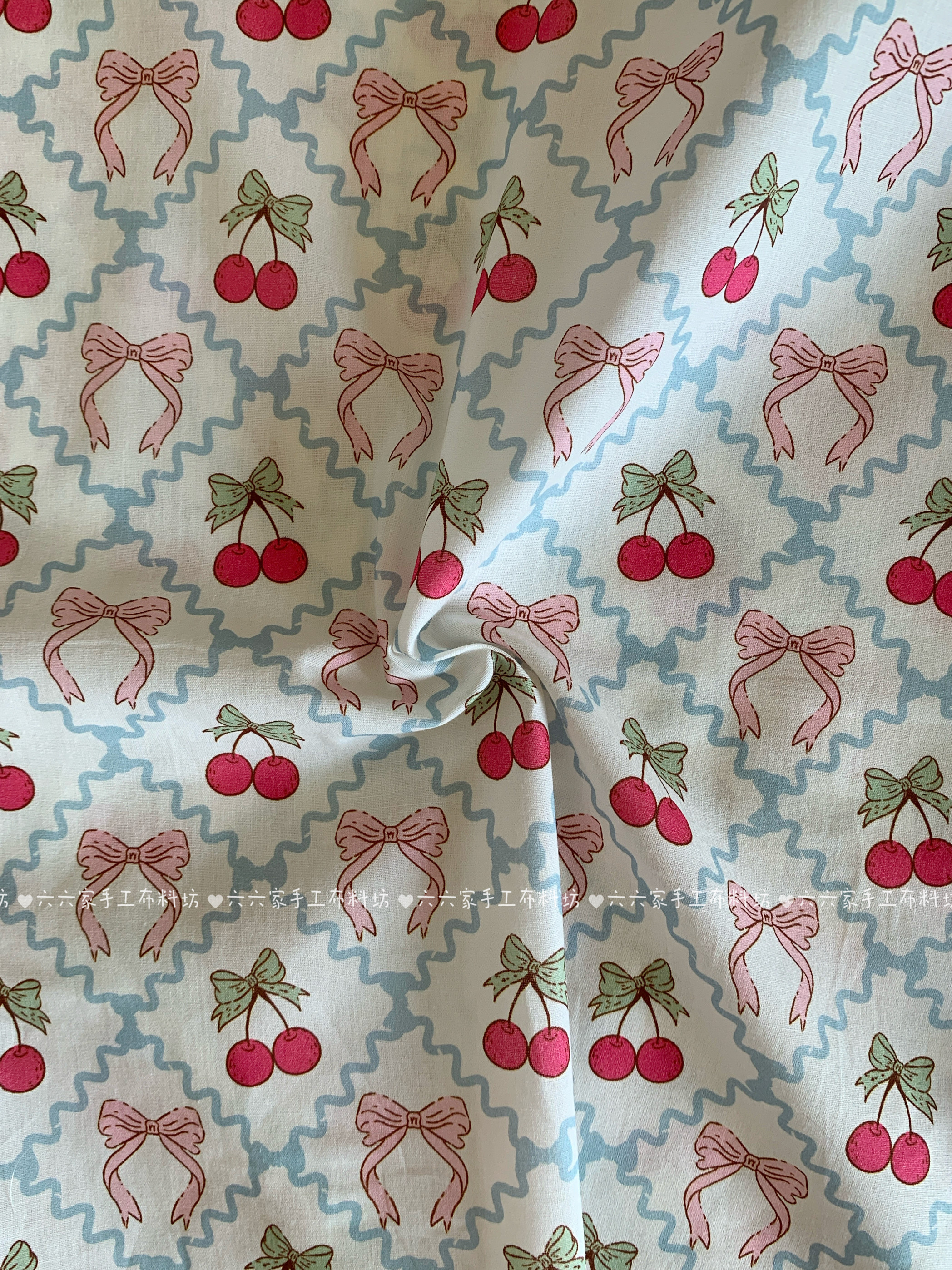 六六家40支全棉印花布料可爱樱桃蝴蝶结面料家居服发饰童装diy布