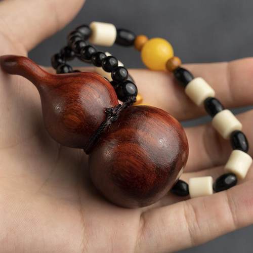 紫檀木雕刻文玩手把件