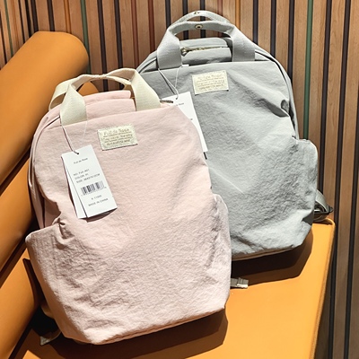 2025春夏限定新色！新款轻便通勤双肩包男女学生书包旅行包包背包