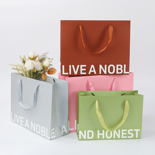 手提纸袋定制印刷logo服装店高档礼品袋环保纸袋化妆品购物袋定做