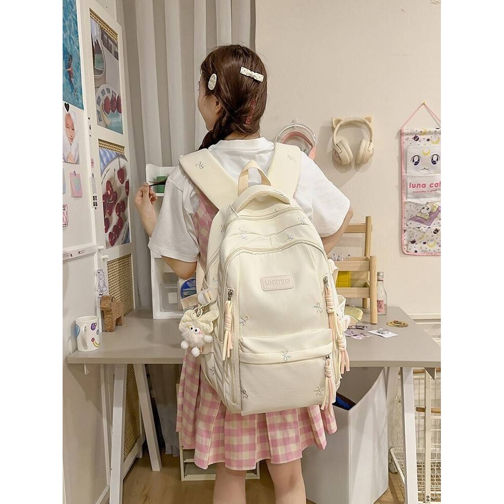 专柜品牌韩系奶油白蝴蝶结双肩书包柔和治愈多层收纳初高中女生上