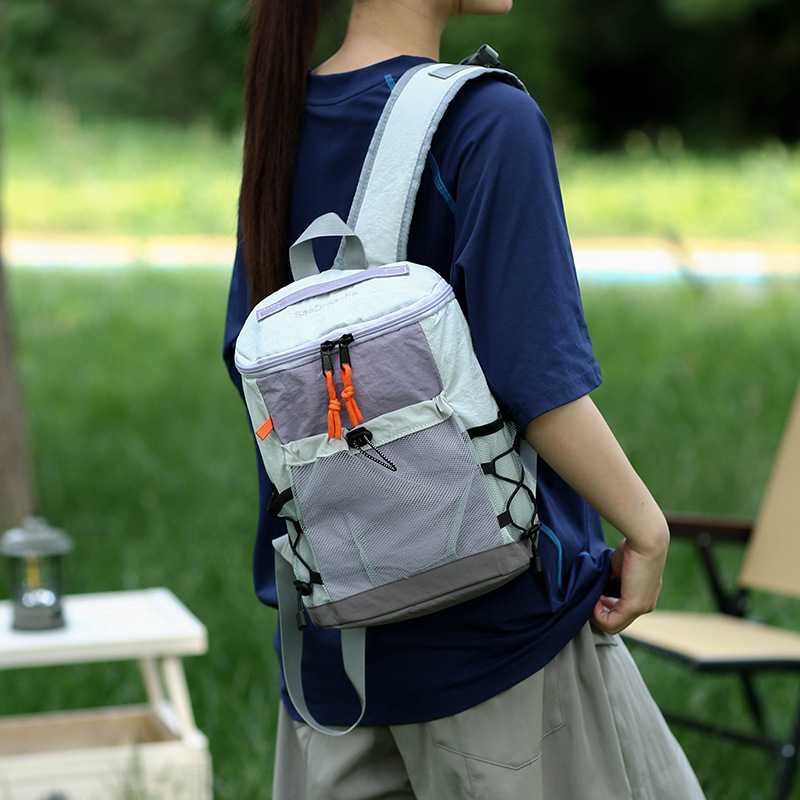 专柜品牌户外ins新款高颜值清新网抽绳背包情侣轻便旅行登山大容