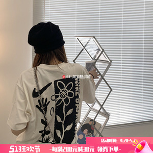 Nike耐克男女情侣款小花卡通涂鸦休闲运动宽松短袖T恤 DX3328-905