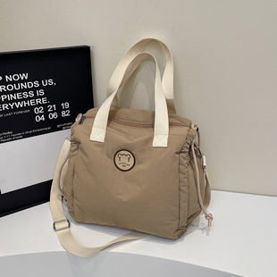 新款高级感手提包便携休闲斜挎女包大容量外出轻便行李袋旅行包女