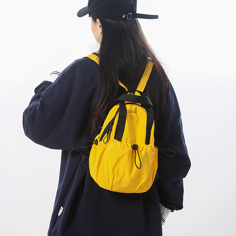 轻便旅游双肩包男多功能户外旅行包运动骑行背包女百搭通勤斜挎包