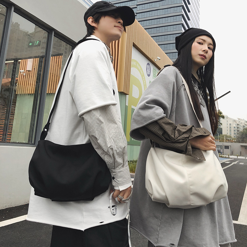小众慵懒风帆布包女简约百搭大容量通勤斜挎包女轻便收纳单肩包男