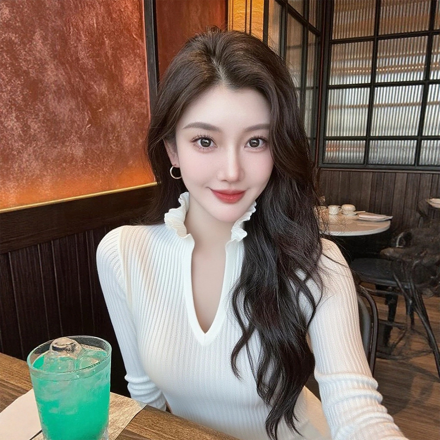 超好看白色针织长袖T恤女2025秋季新款韩系氛围感绝美木耳边上衣