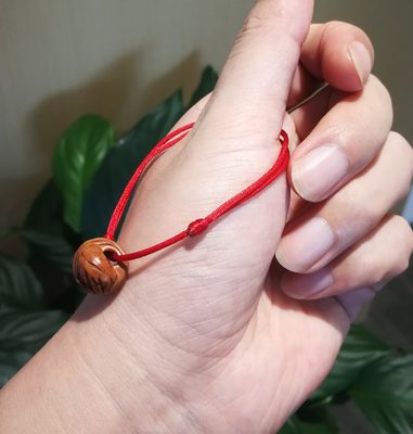 野生桃核红绳编织手工雕刻