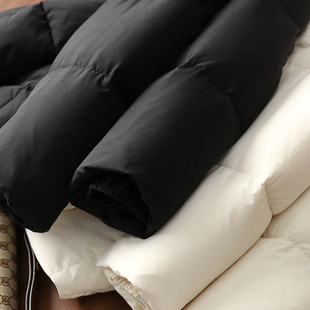 淘么淘《北海道恋曲》可溯源95白鹅绒三防宽松中长款连帽羽绒服女