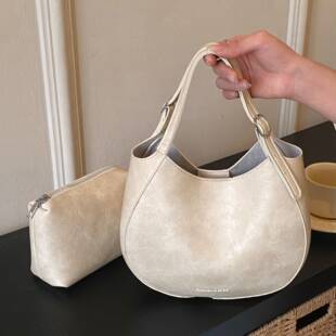 专柜品牌复古小众质感手提女士包包2026年春季新款潮马鞍包百搭单