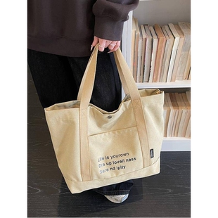 专柜品牌跨境新款帆布包女2026韩版字母文艺上课手提包通勤外出单