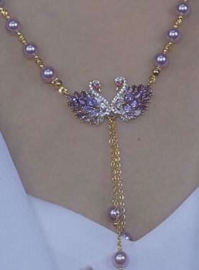 紫色珍珠双天鹅项链女2026新款轻奢小众设计高级感古风毛衣链配饰