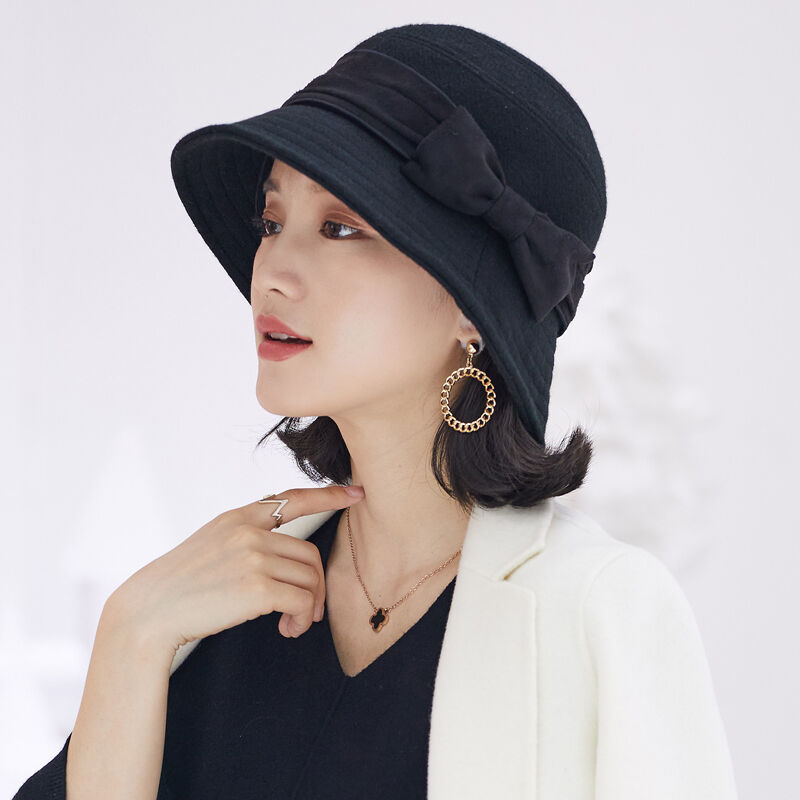 677888礼帽英伦复古日系渔夫帽帽子女秋冬季时尚毛呢韩版潮流蝴蝶属于什么档次？