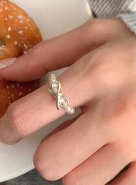 包邮甜美仿珍珠蝴蝶结戒指女手作串珠弹力S925镀银指环气质优雅食