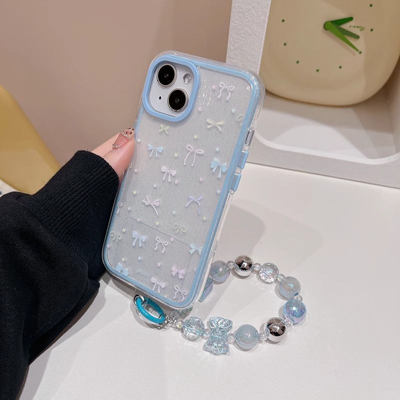 日韩清新蓝色蝴蝶结带链条iPhone16promax手机壳苹果14/13防摔15