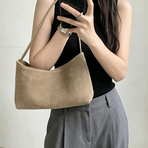 韩版小众腋下包女2026新款磨砂牛皮简约通勤单肩斜挎弯刀包