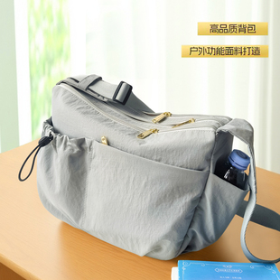 轻便尼龙布斜挎包大容量2025旅行运动休闲多口袋通勤单肩包饺子包