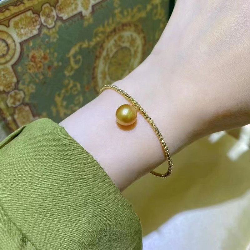 母贝珍珠茶金色注金手镯