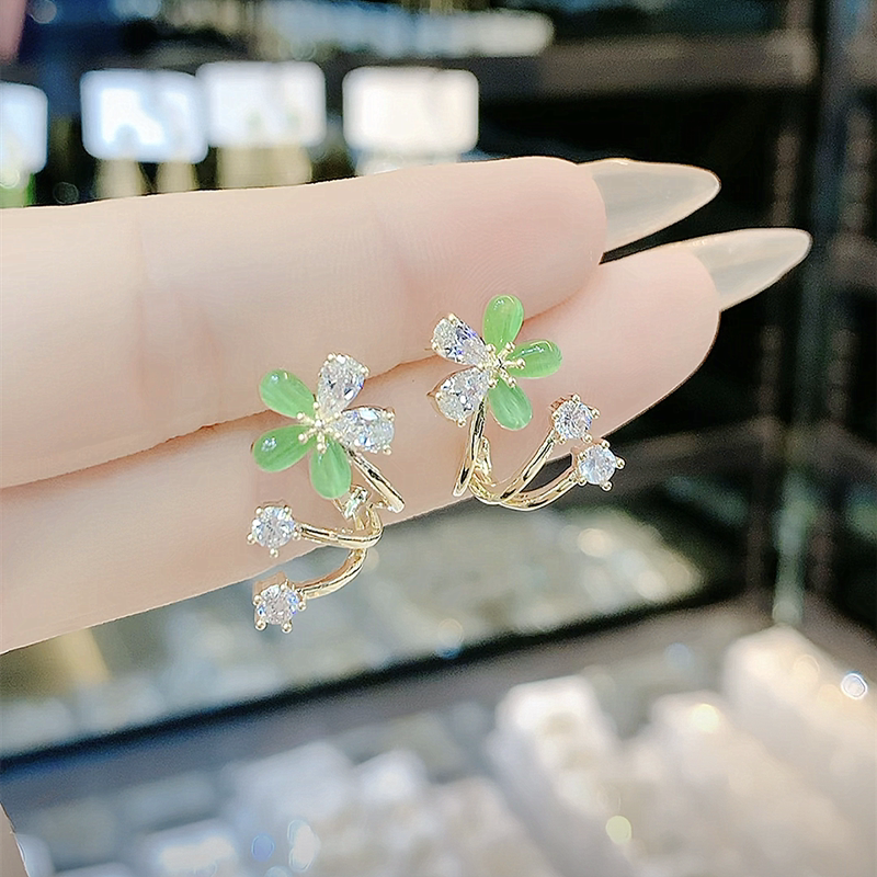 s925银针精致猫眼石花朵耳钉