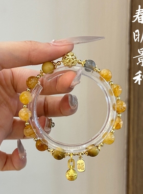 天然黄胶花水晶手链女款吞金兽黄虎眼石灰月光手串简约招财送礼物
