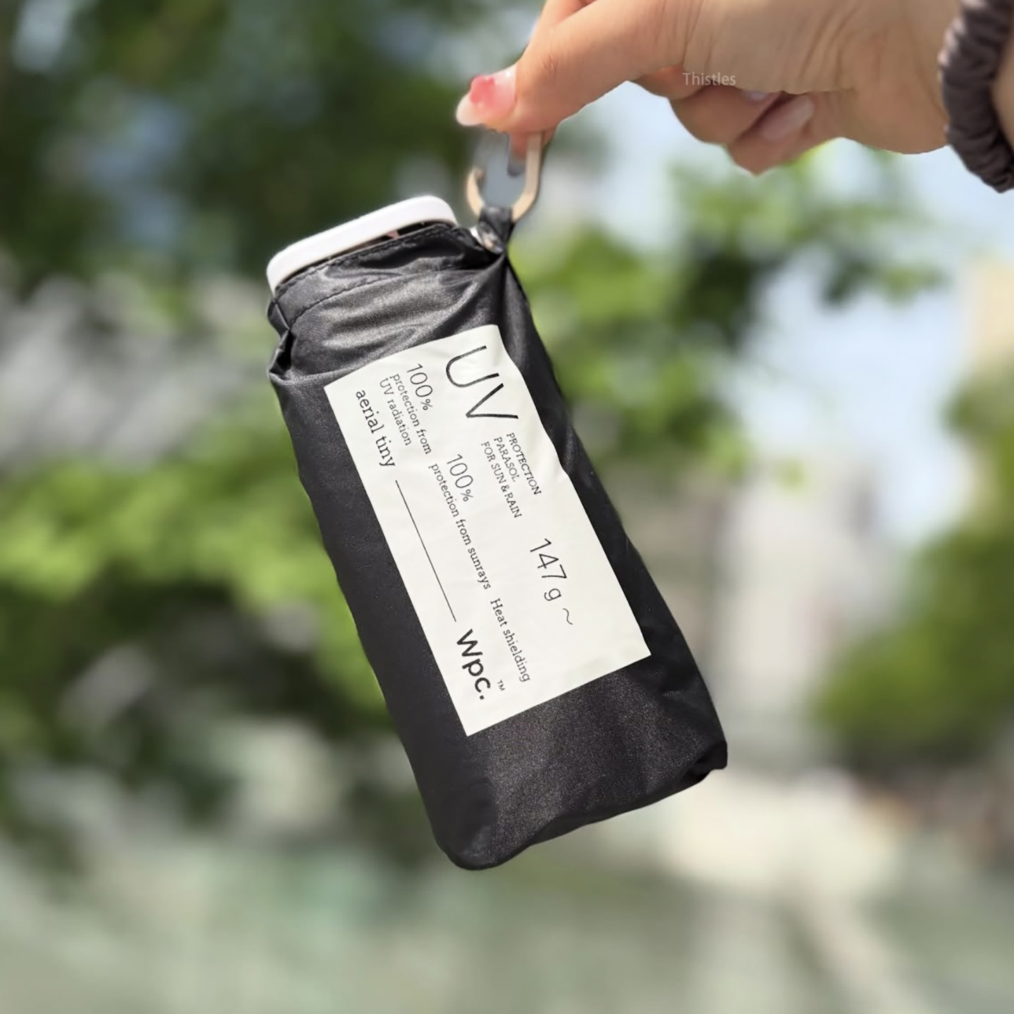 日本wpc伞卡片羽毛超轻空气air遮阳太阳晴雨两用防紫外线五折黑胶