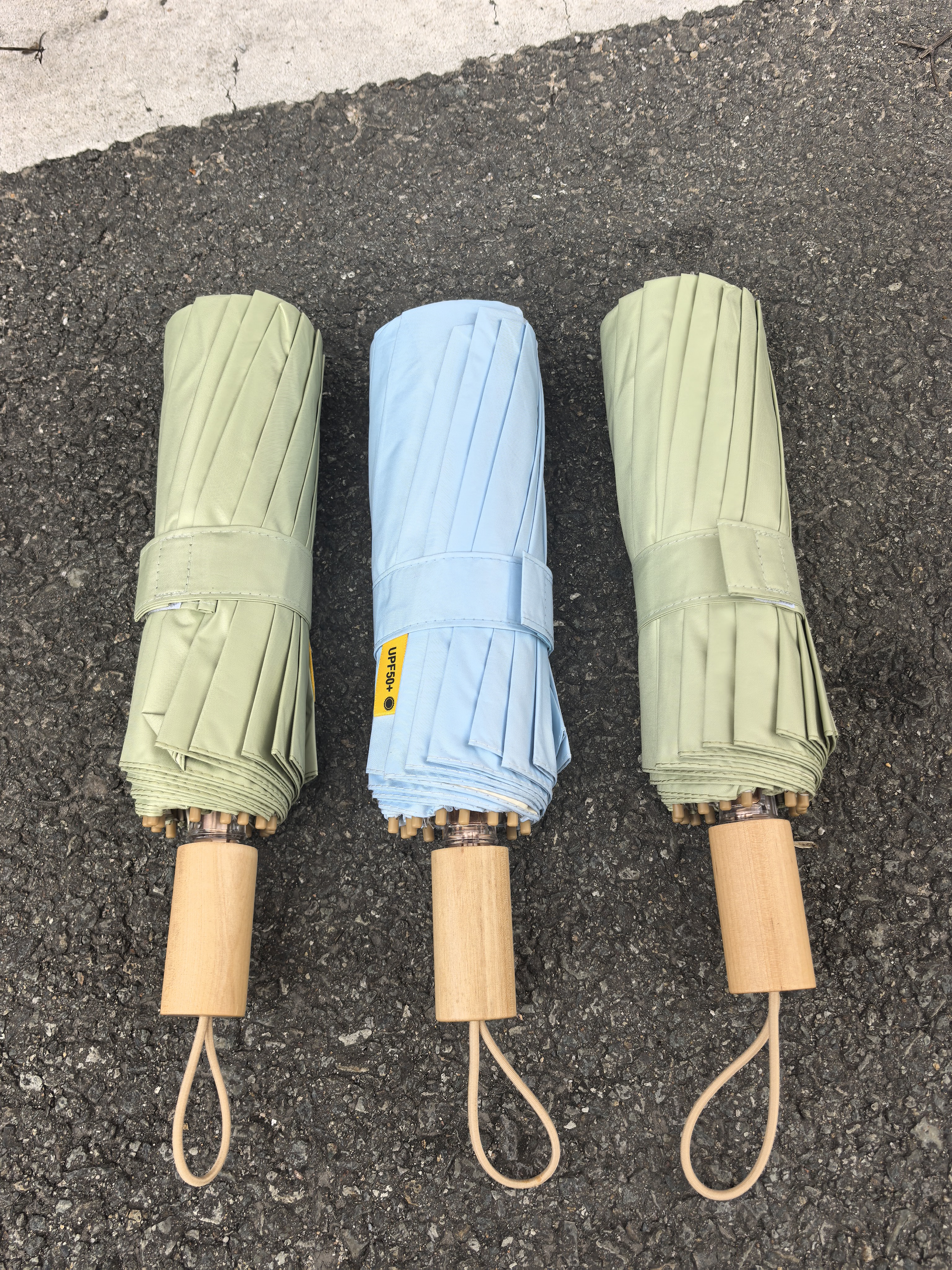 简约素色16骨铝合金彩胶手动折叠成人女士防风遮阳收纳晴雨两用伞图片