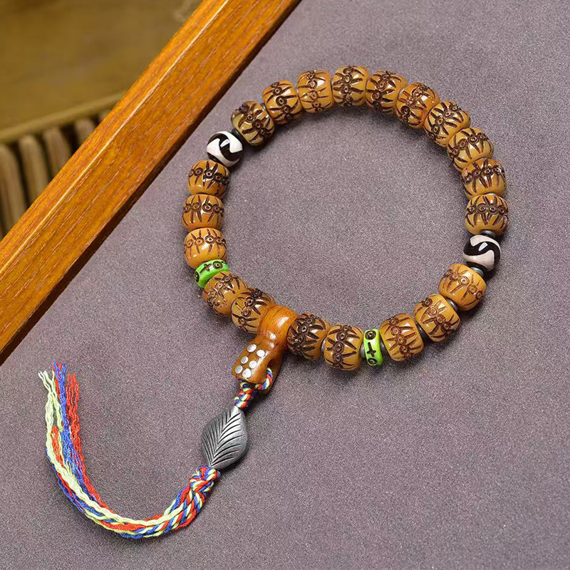 藏传回流骨桶珠雕刻手串单圈