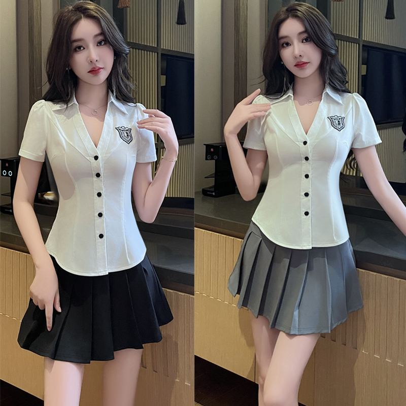 梭织面料纯色性感系扣百褶裙