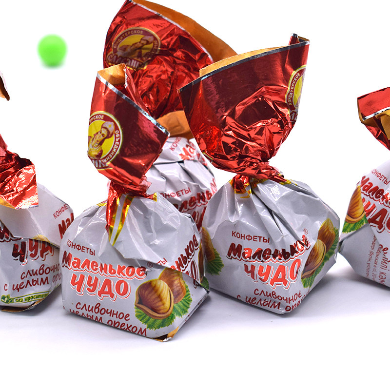 俄罗斯糖果巧克力奶罐外层花生巧克力中间奶油榛仁威化夹心零食品