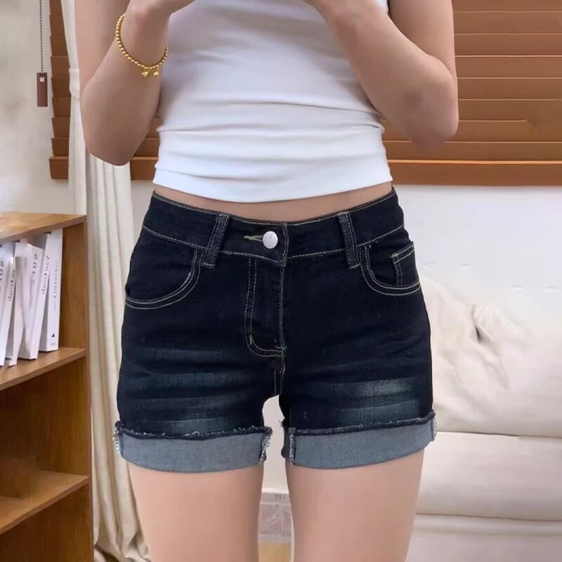 深蓝色高腰牛仔短裤女2026夏季新款卷边设计感直筒裤性感包臀热裤