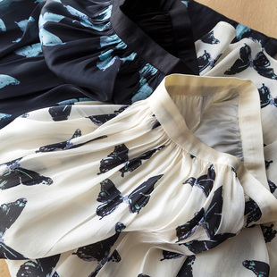 一眼心动 飘逸流光浪漫蝴蝶印花松紧高腰珠光纱A字半身裙伞裙子女