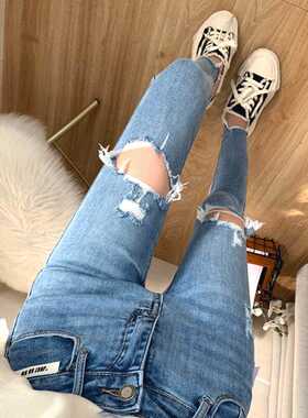 浅蓝色破洞牛仔裤女夏秋韩国ins新款高腰弹力小脚裤修身紧身9分裤