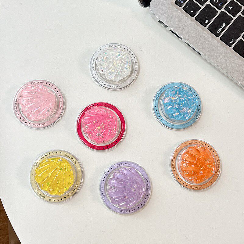 ins彩色亮片韩国手机气囊支架女款立体贝壳磁吸桌面支架跨境批发