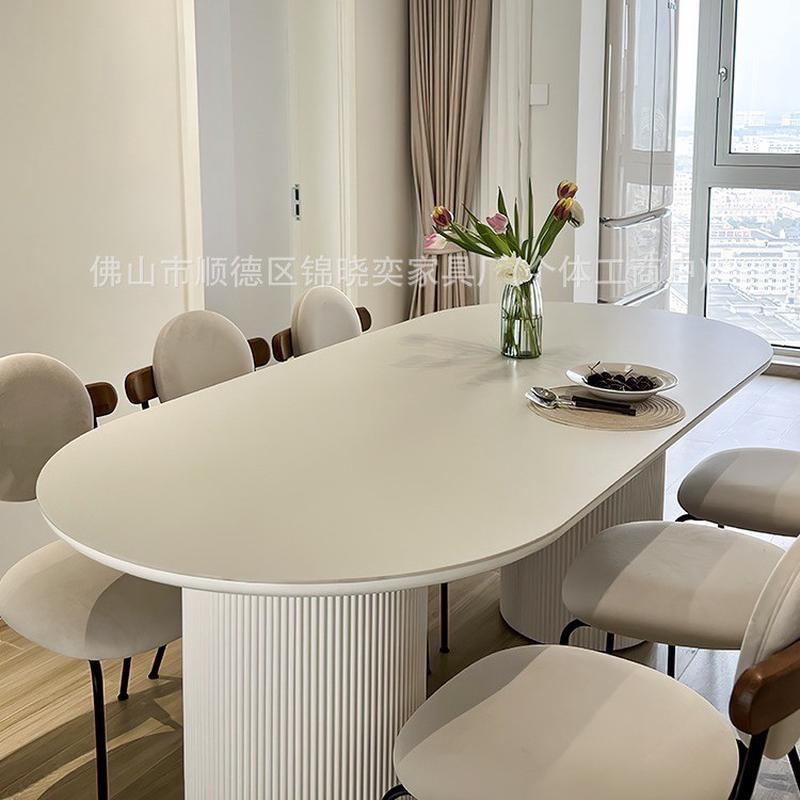奶油风椭圆岩板餐桌椅组合家用小户型实木餐桌简约现代长方形饭桌