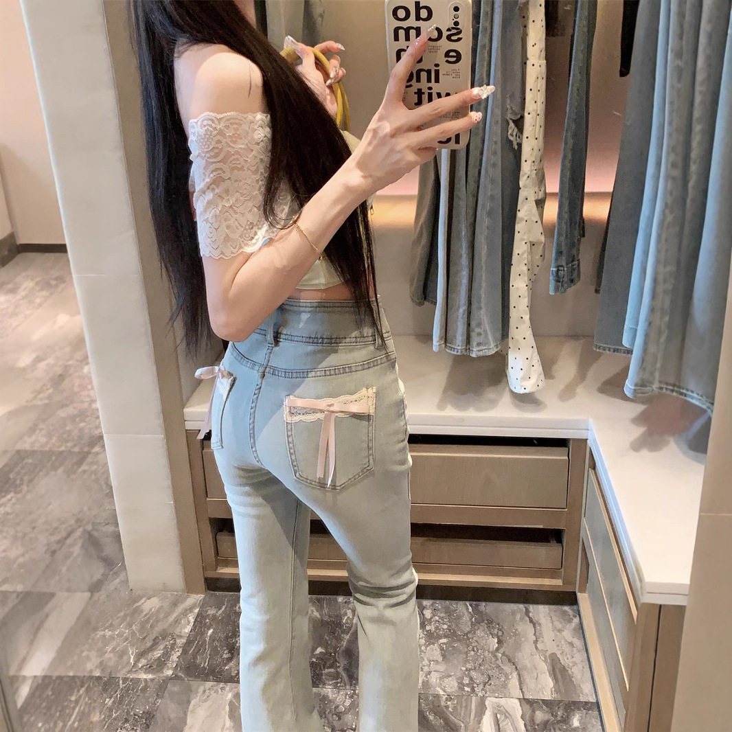 蝴蝶结微喇叭牛仔裤女秋季蓝色紧身包臀马蹄裤子高腰显瘦拖地长裤