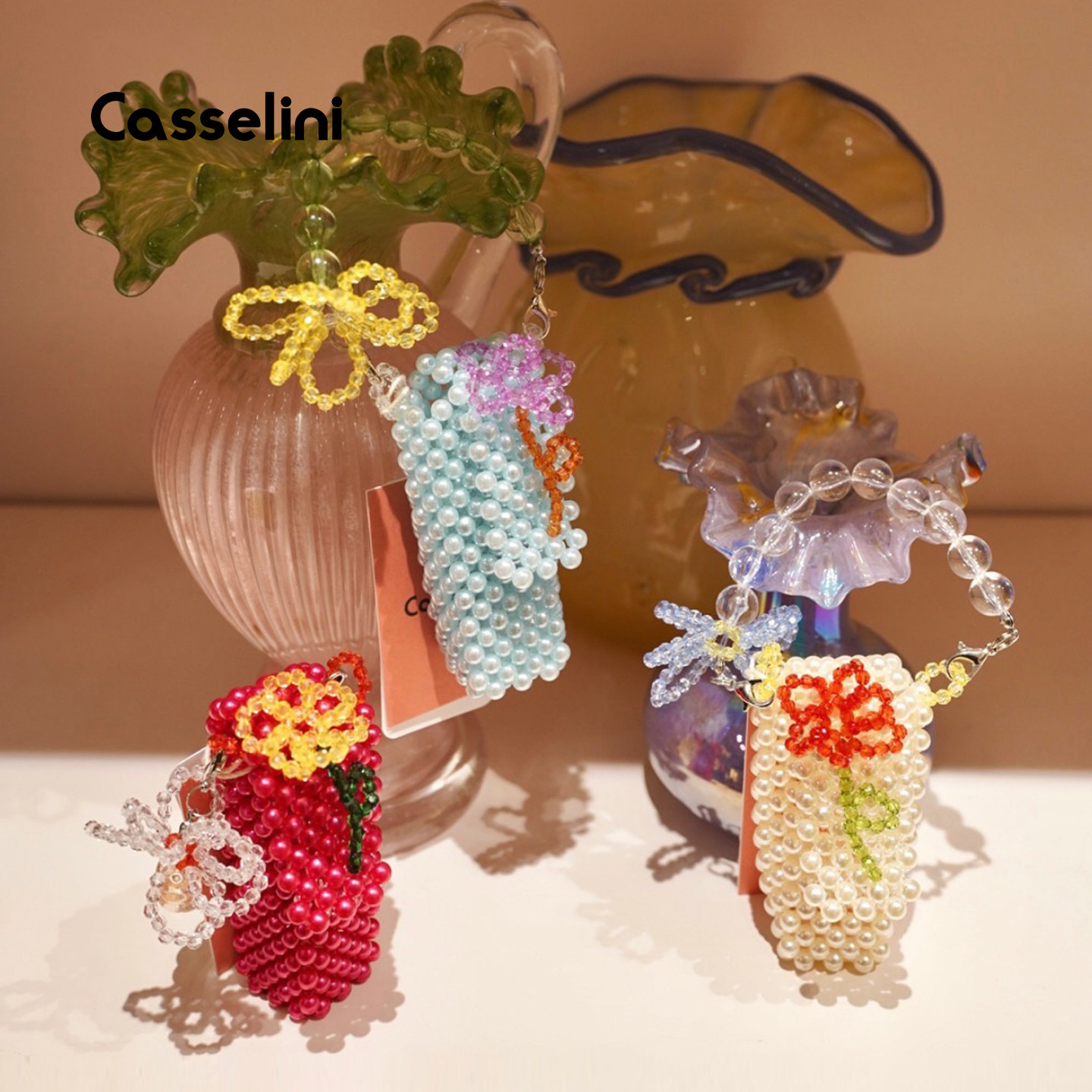 Casselini串珠花朵口红包女挂件