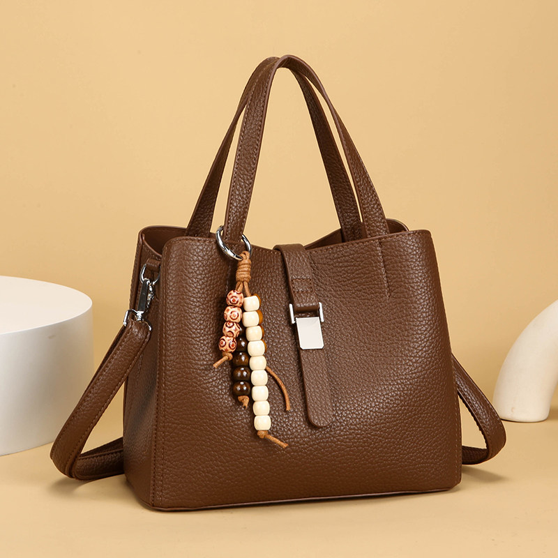 真皮水桶包包女2025新款头层牛皮单肩斜挎包大容量通勤女士手提包